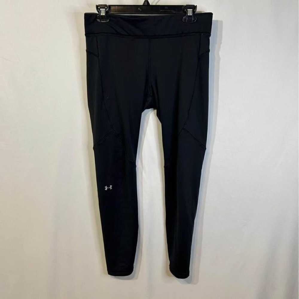 Under Armour woman’s workout pants. Size M/L New condition. Black.